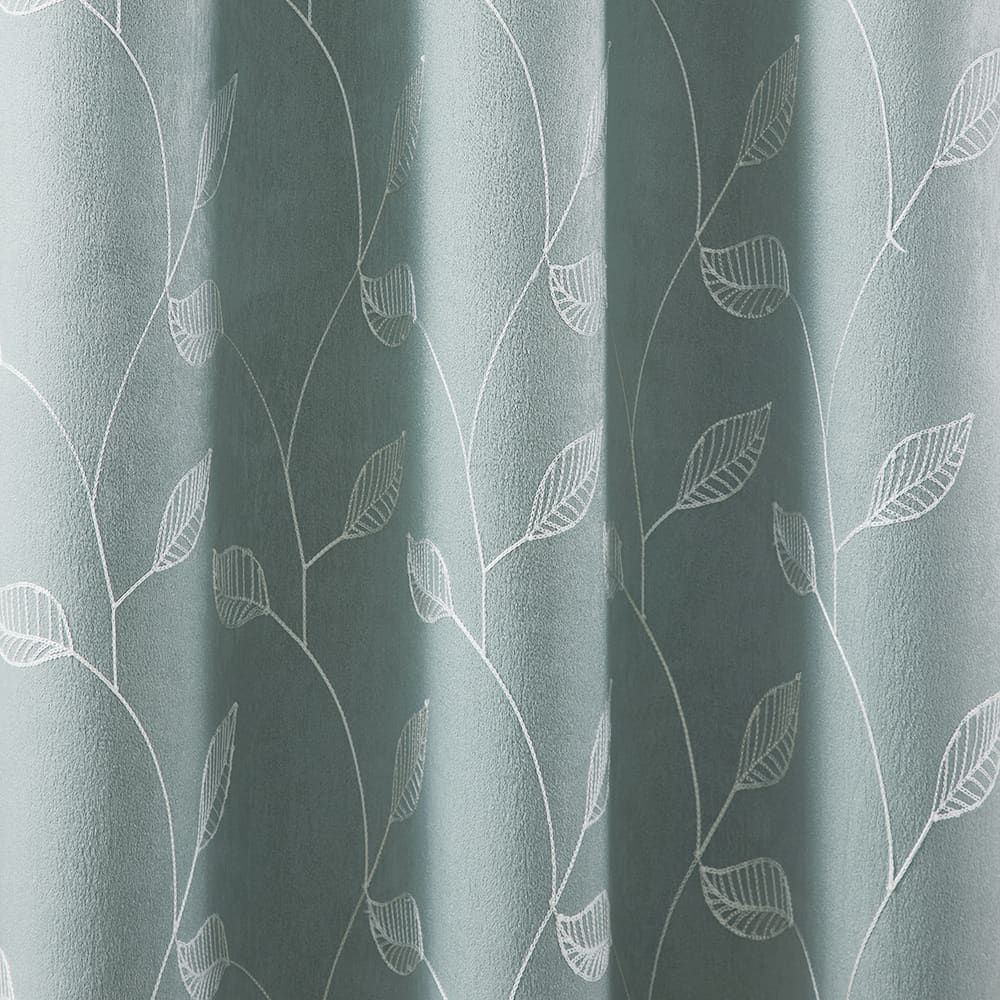 The folds of a Alona Leaves aqua panel, close up