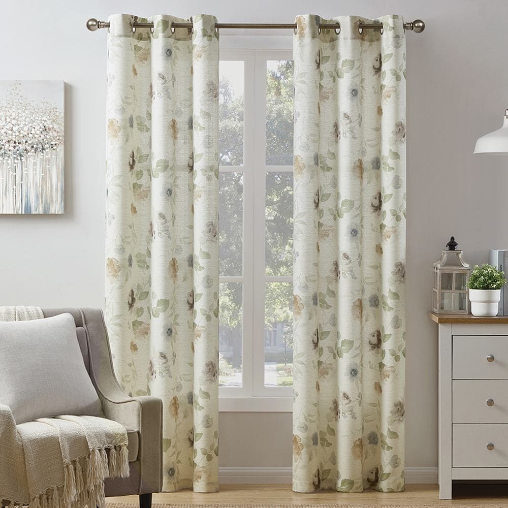 Blooming light filtering panels, a soft floral print, at a window beside an armchair