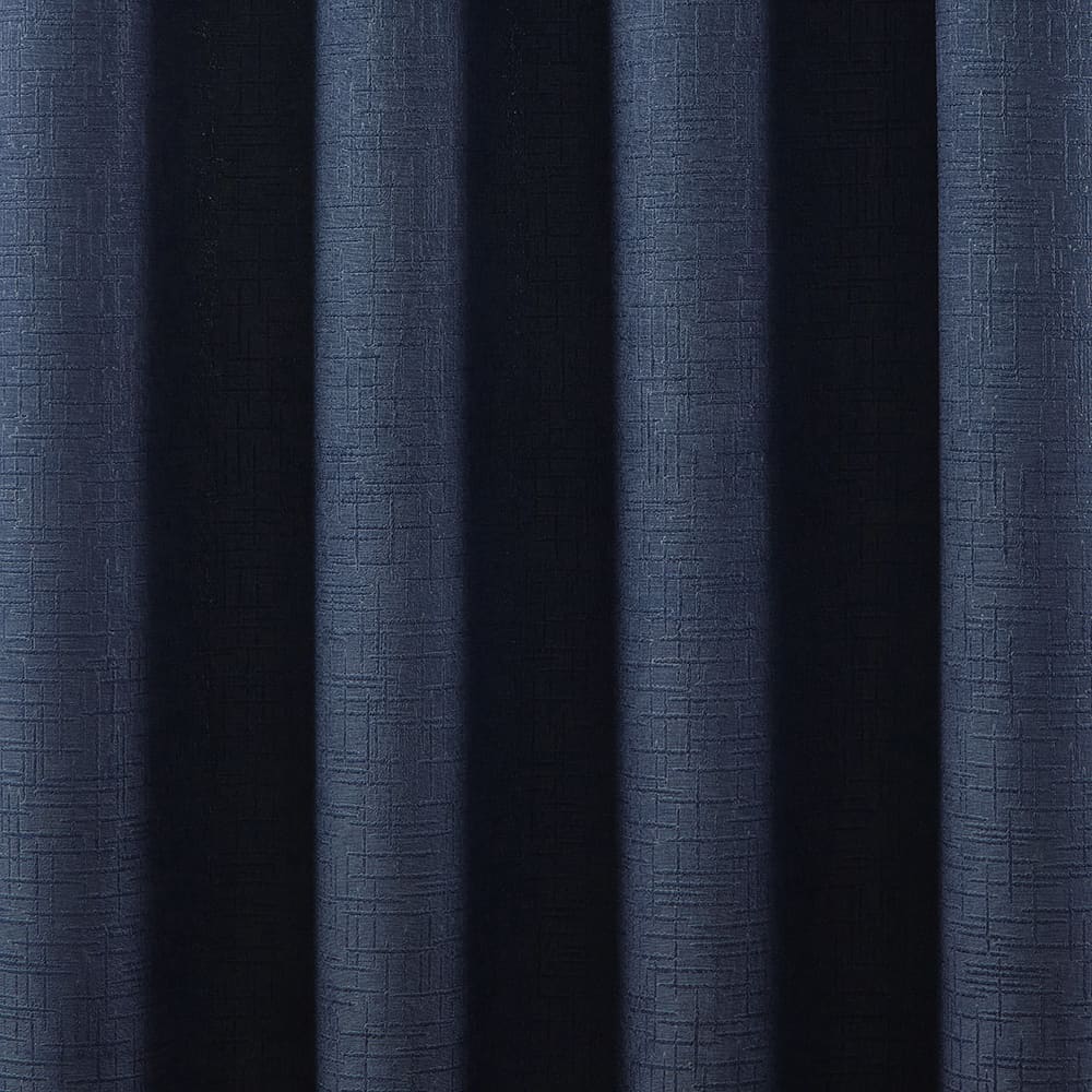The folds of a Hayden blue panel, close up