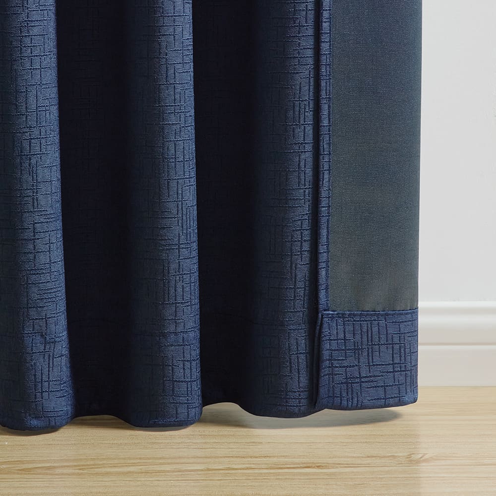 The bottom of a Hayden blue panel where it meets the floor