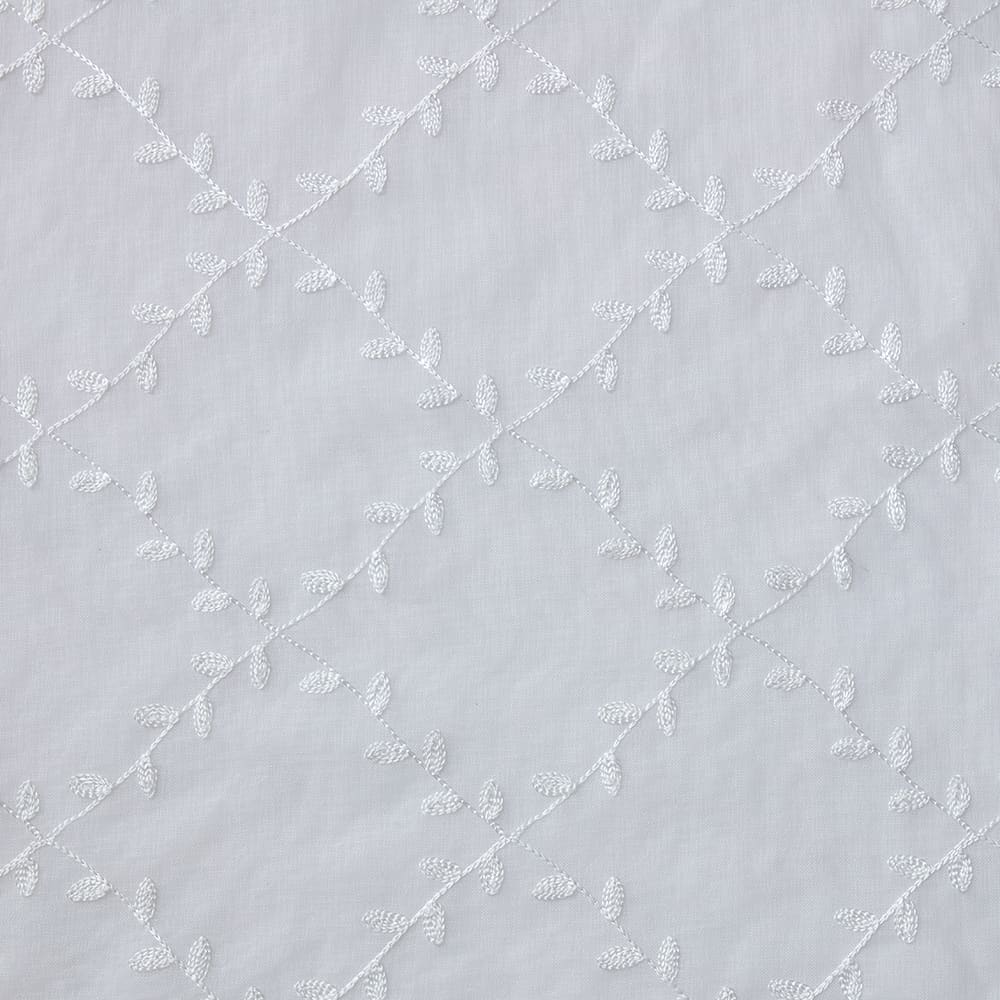 Flat close-up of the Leaf Embroidery white fabric