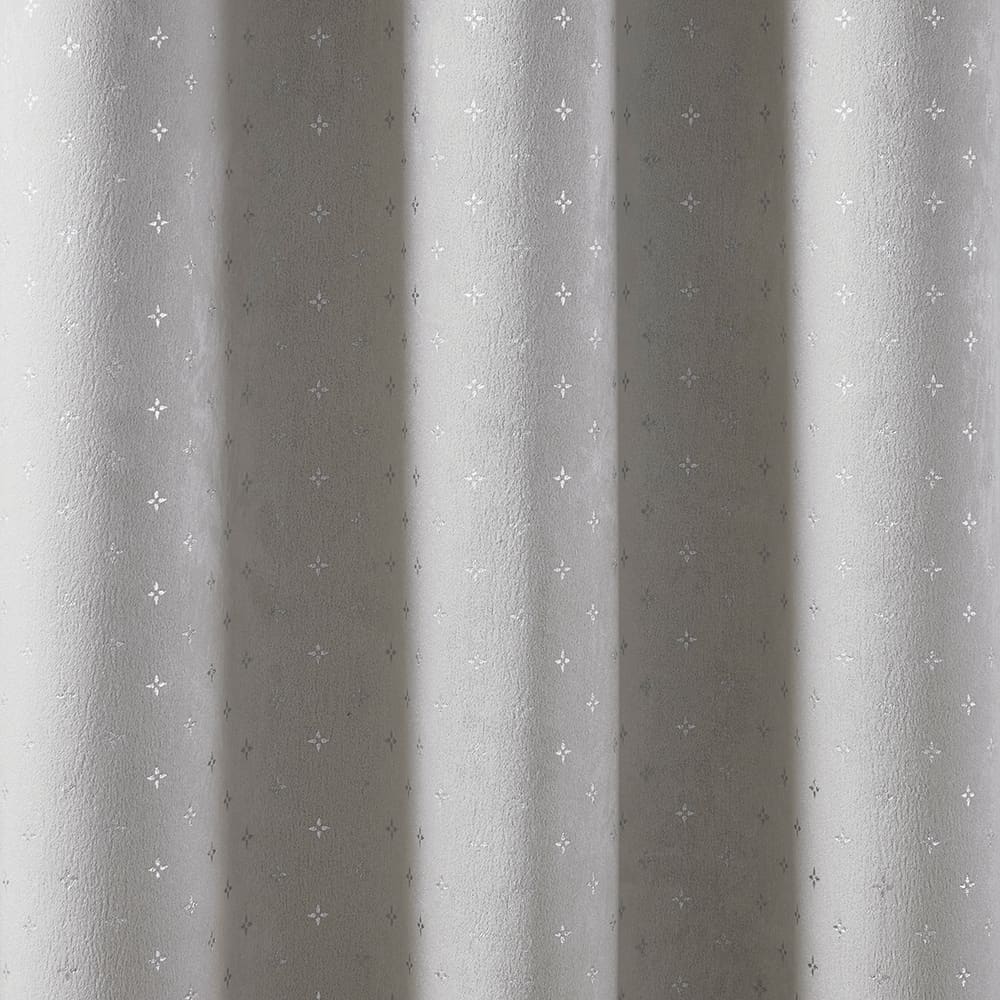 The folds of a Marquee grey with silver foil panel, close up