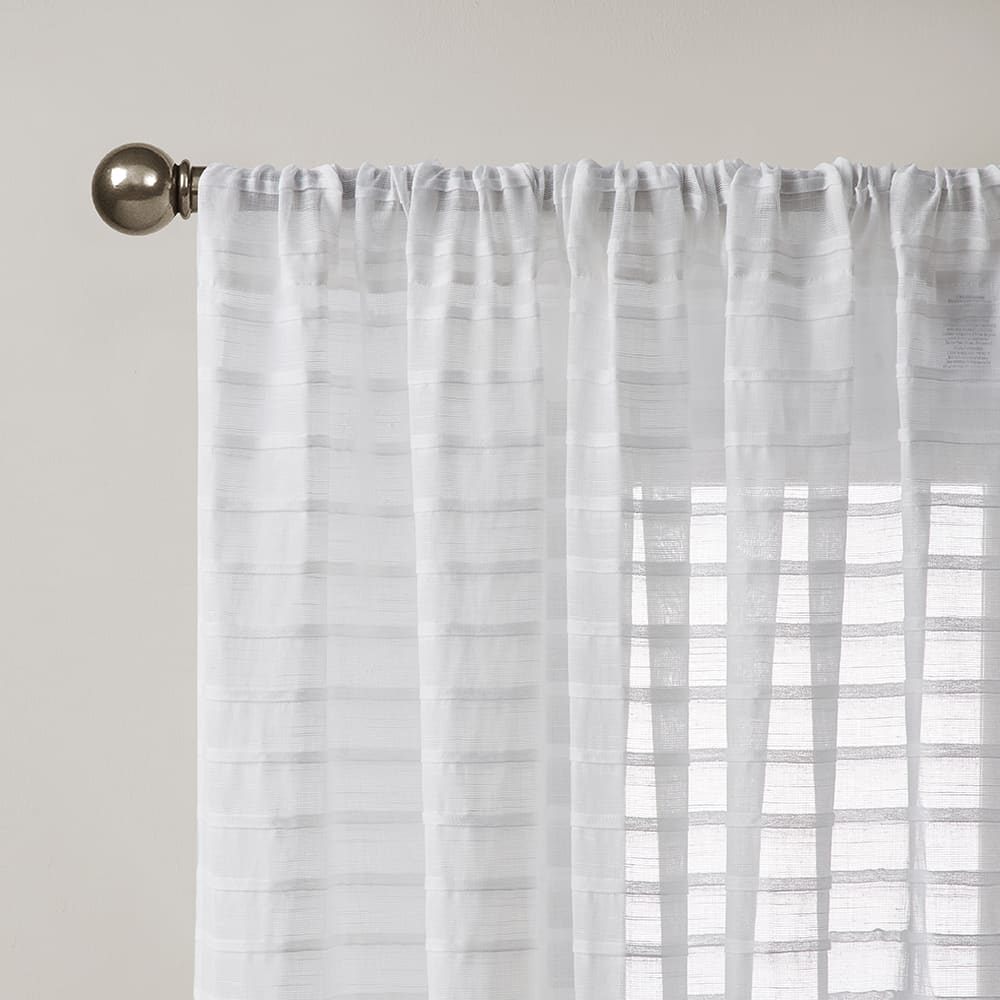 Close-up of the top of a Pleated Stripe white panel on its rod