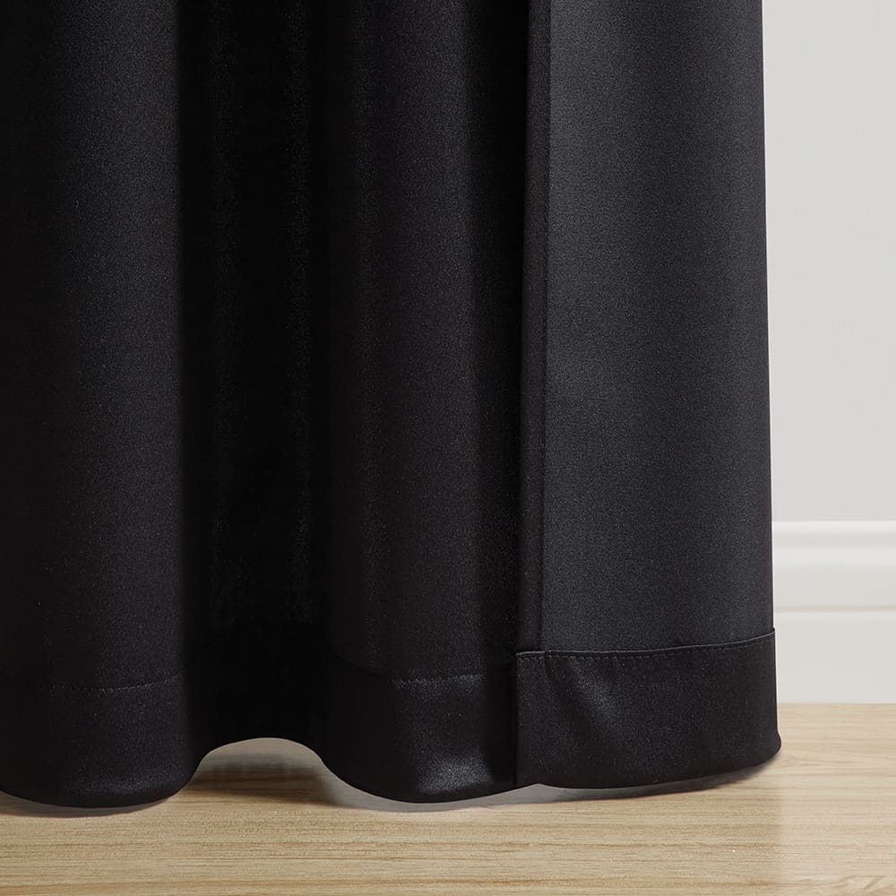 The bottom of a Savoy black panel where it meets the floor