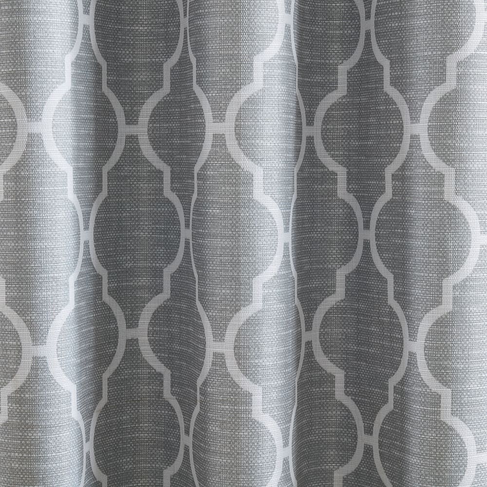 The folds of a Trellis grey panel, close up