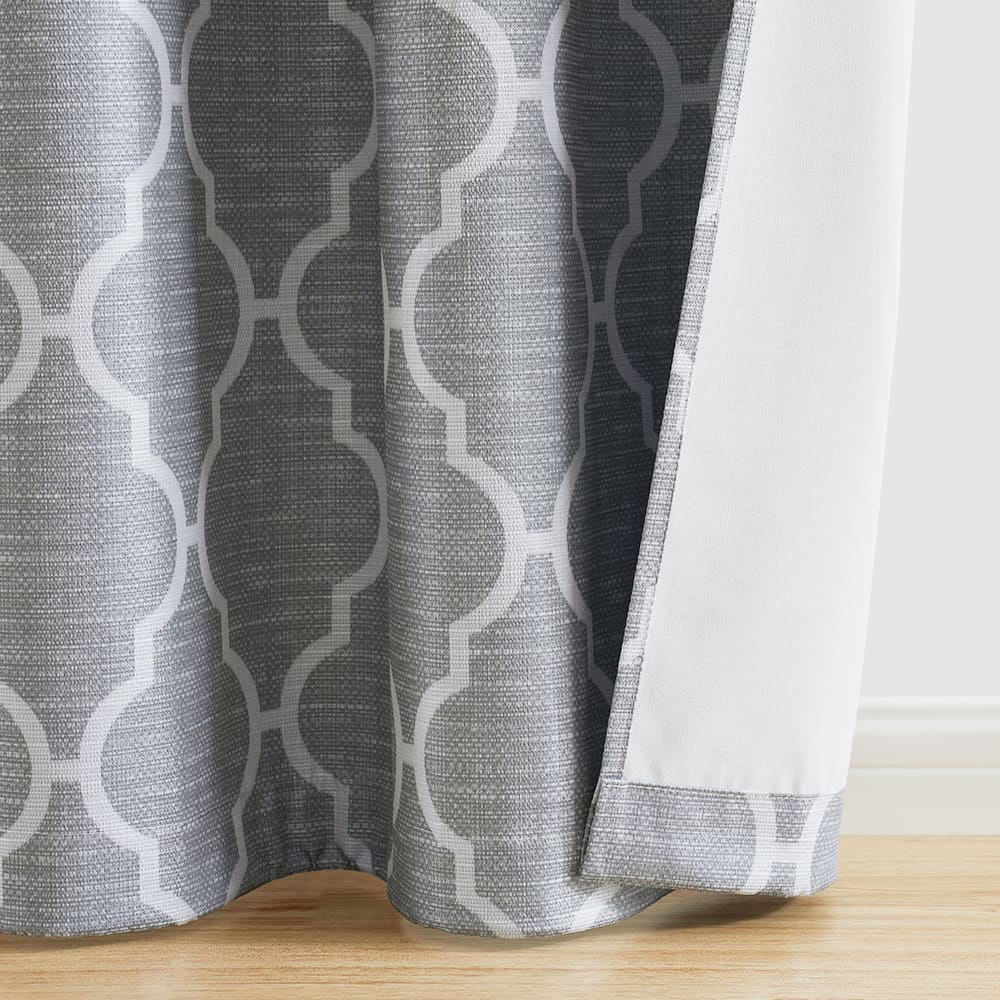 The bottom of a Trellis grey panel where it meets the floor