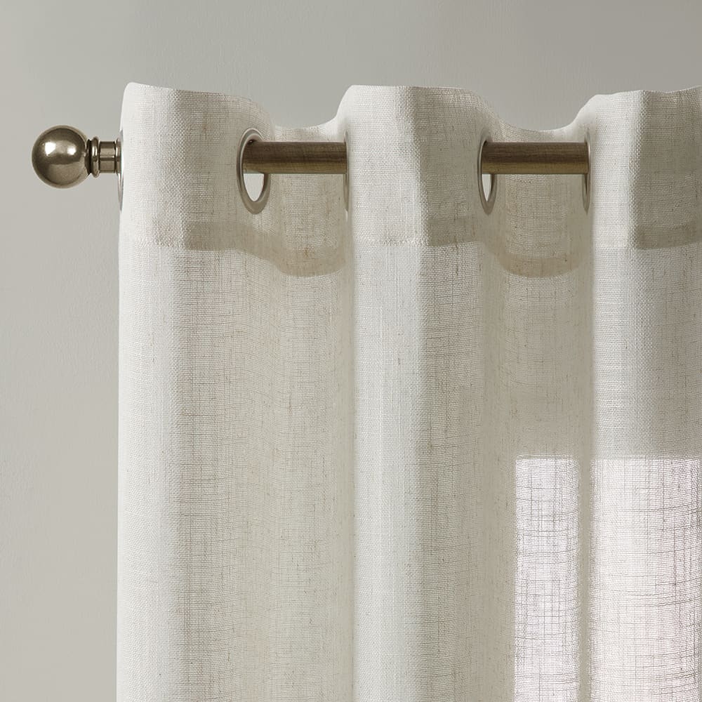 Close-up of the top of a Valencia natural linen blend panel on its rod